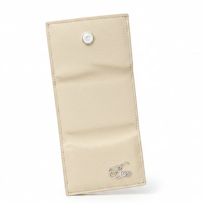 Aricio Mag Ivory leather wallet, showcasing premium handcrafted ivory leather, refined stitching, and elegant interior compartment design.